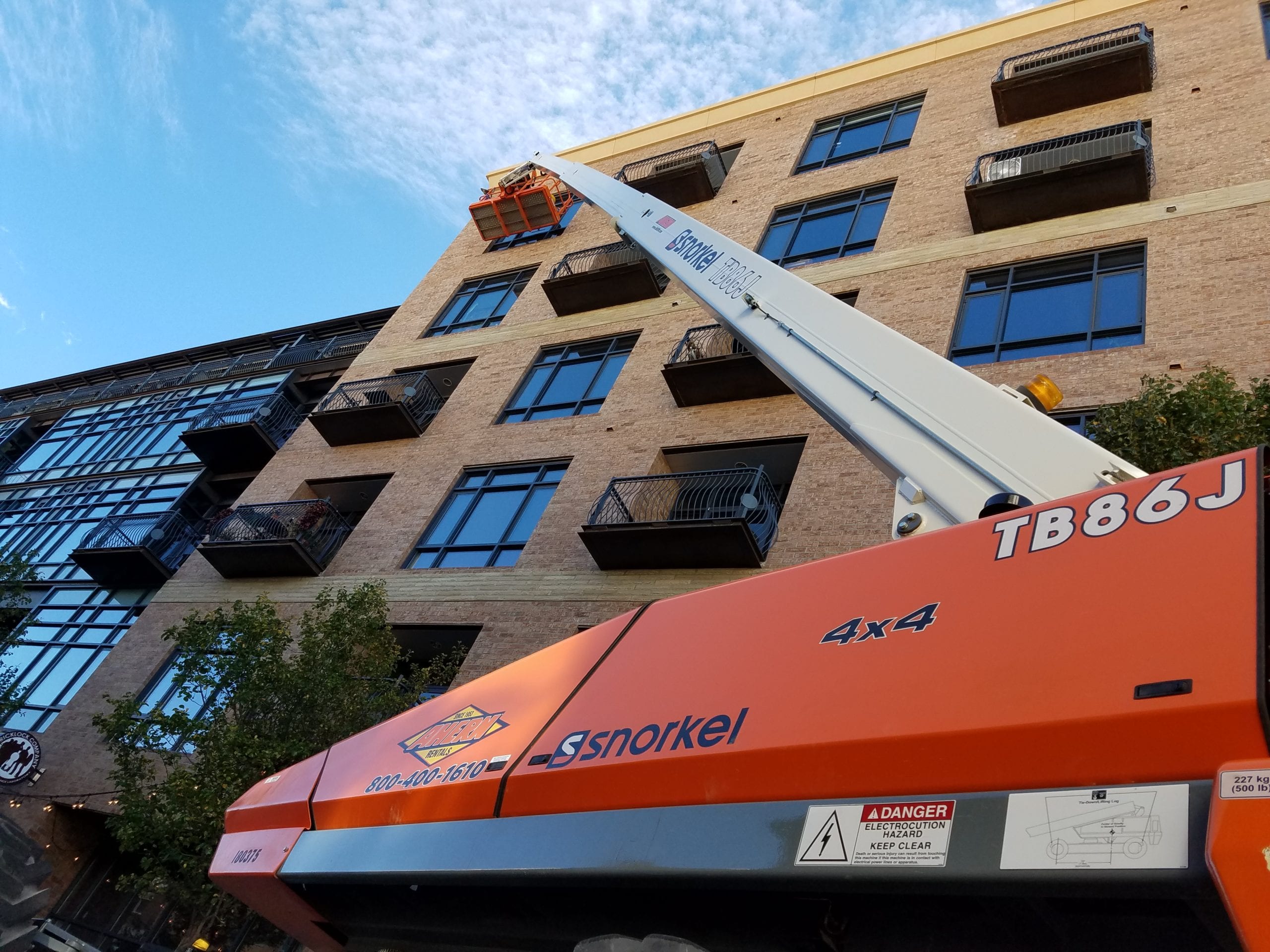 Image of a lift being used to clean commercial windows